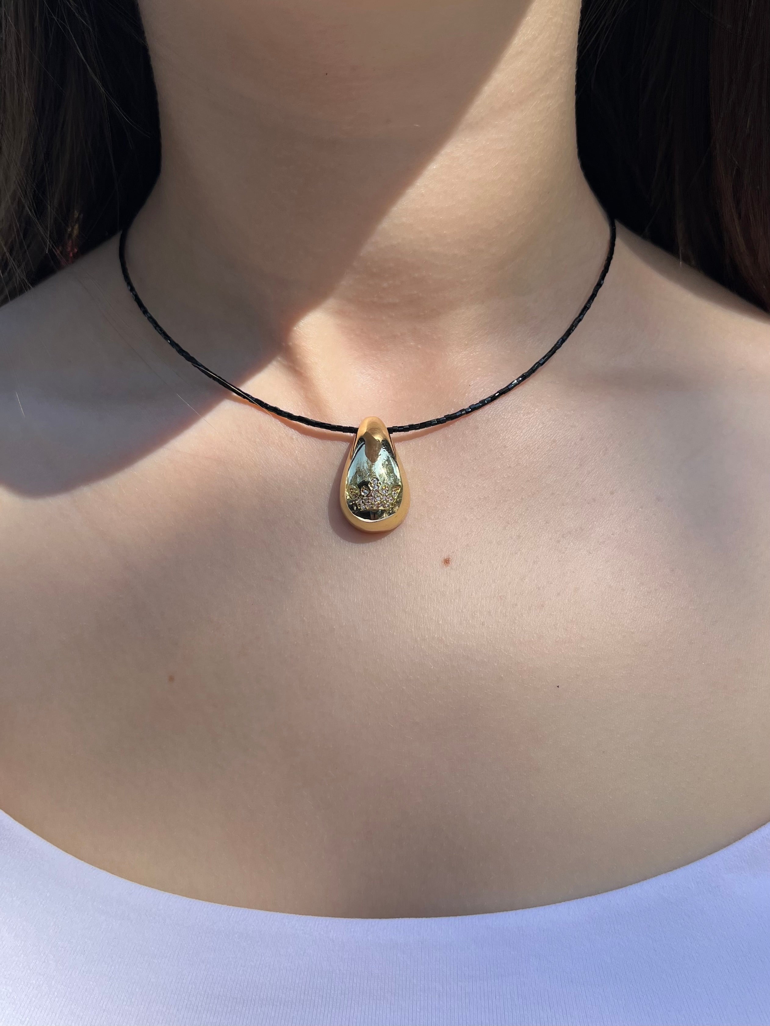Black beaded choker with gold teardrop crown pendants: 18K Gold Plated