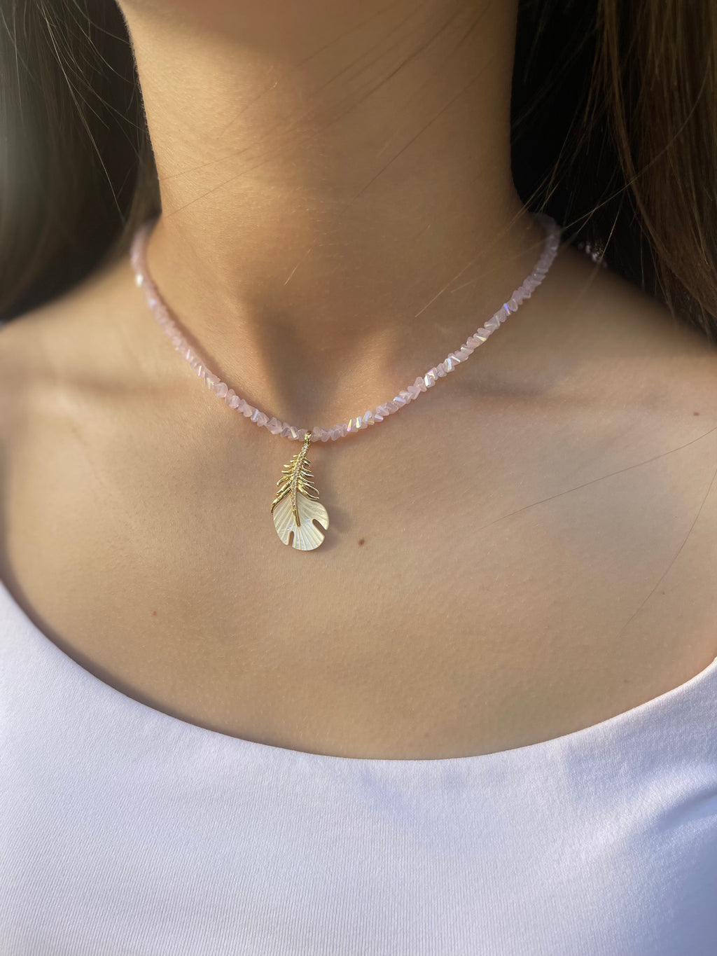 Pink crystal necklace with 14K gold Feather pendant