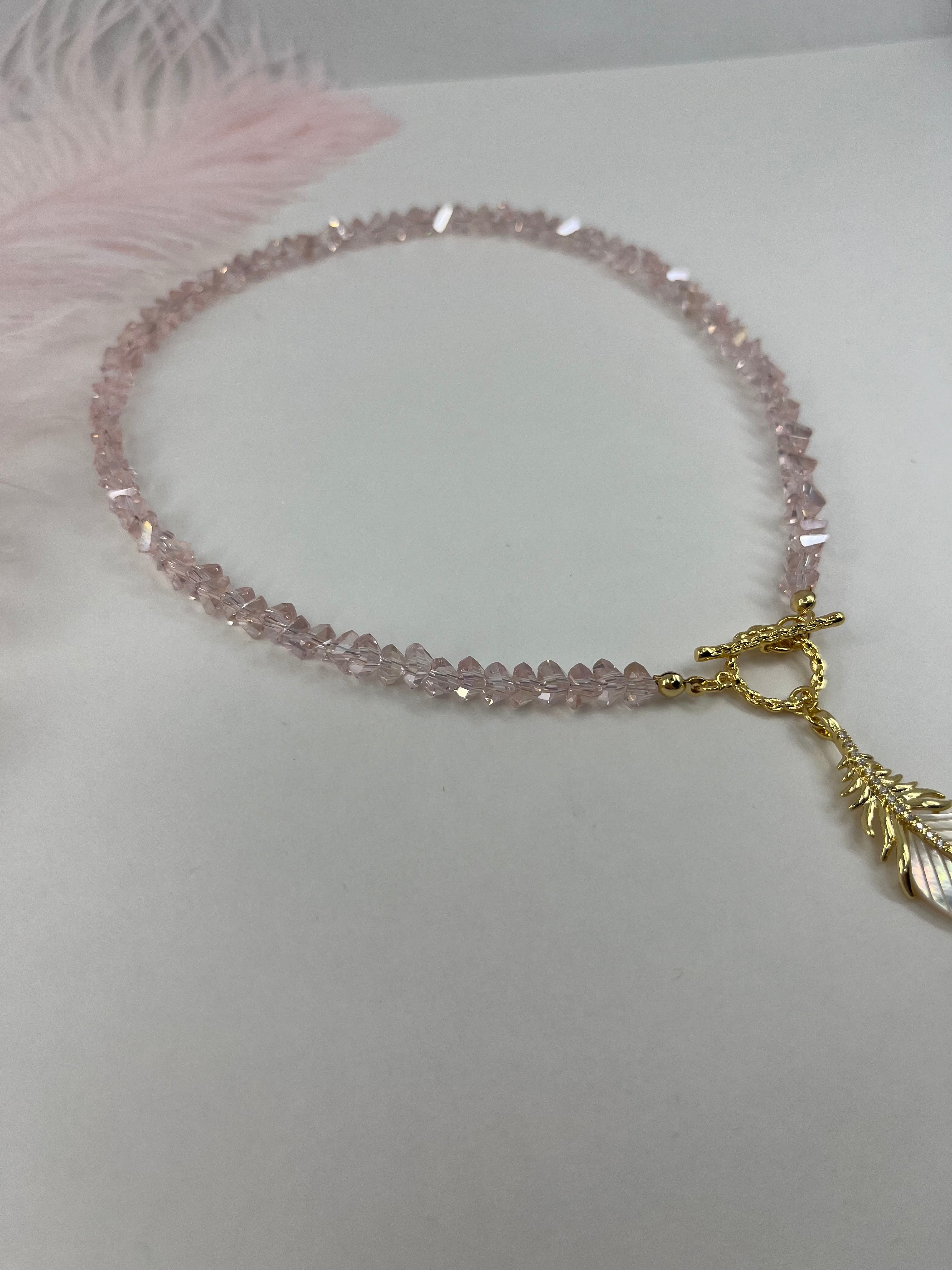 Pink crystal necklace with 14K gold Feather pendant