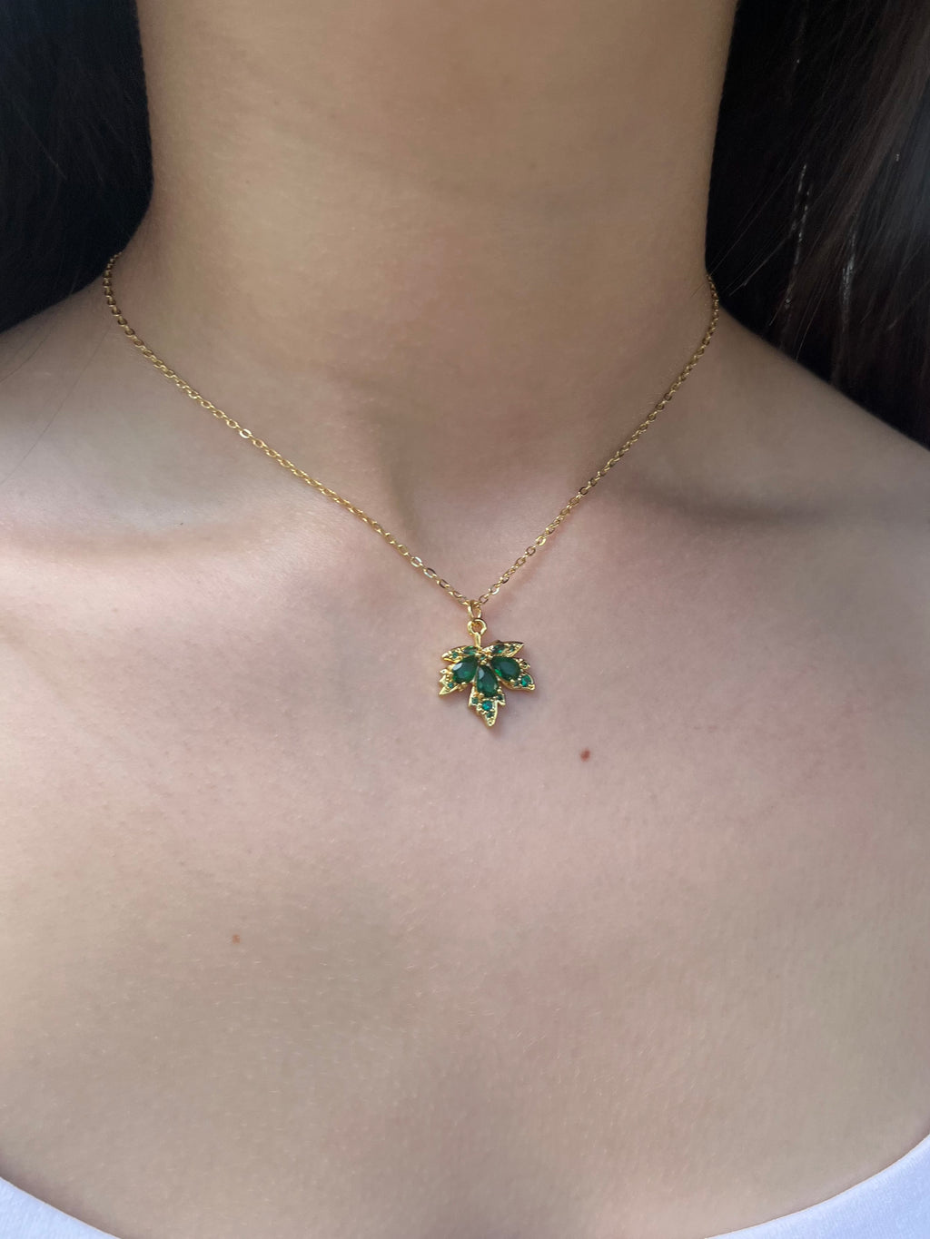 Necklace with 18K Gold maple leaf pendant