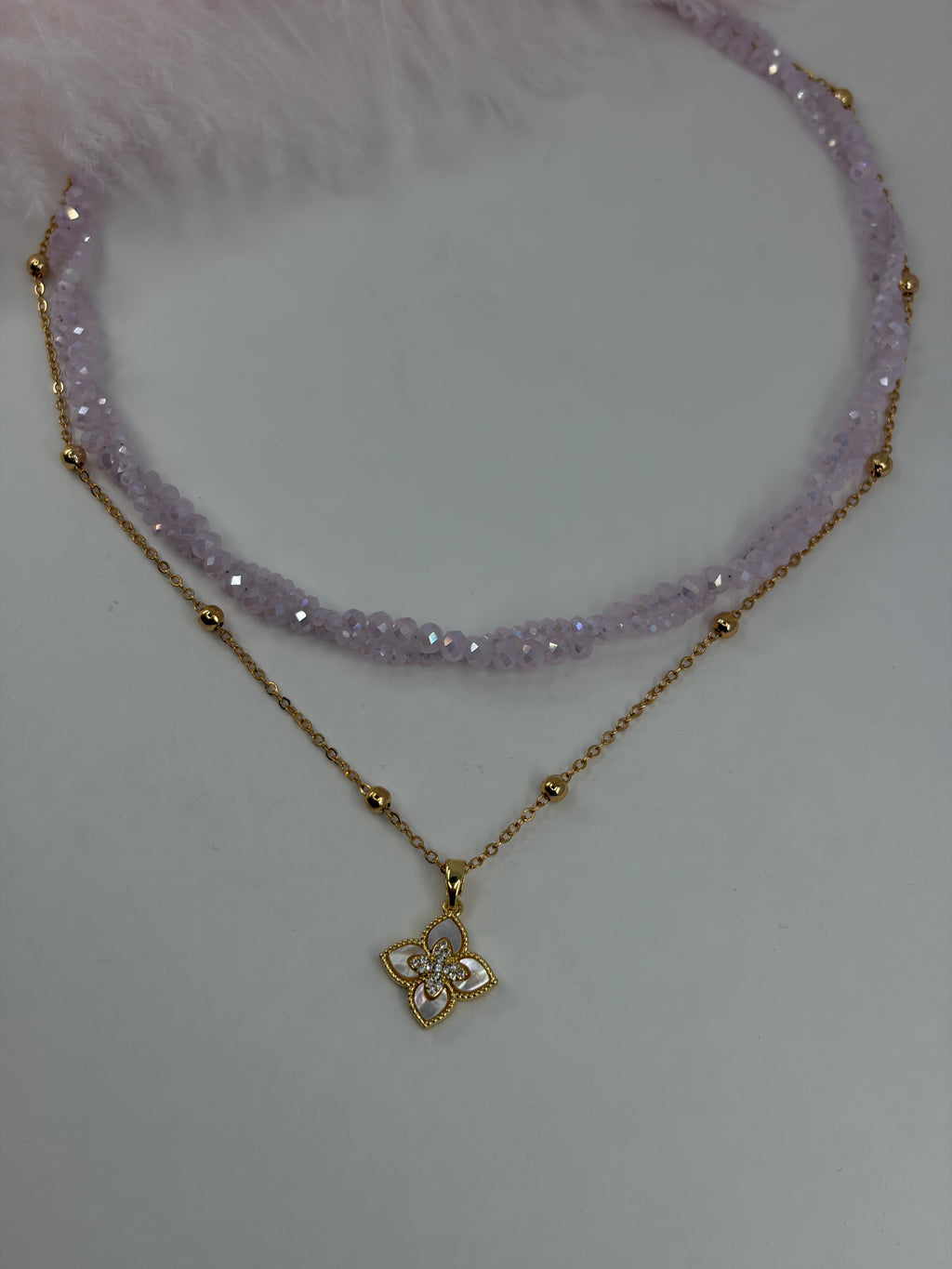 Pink crystal layered necklace with flower pendant pendant