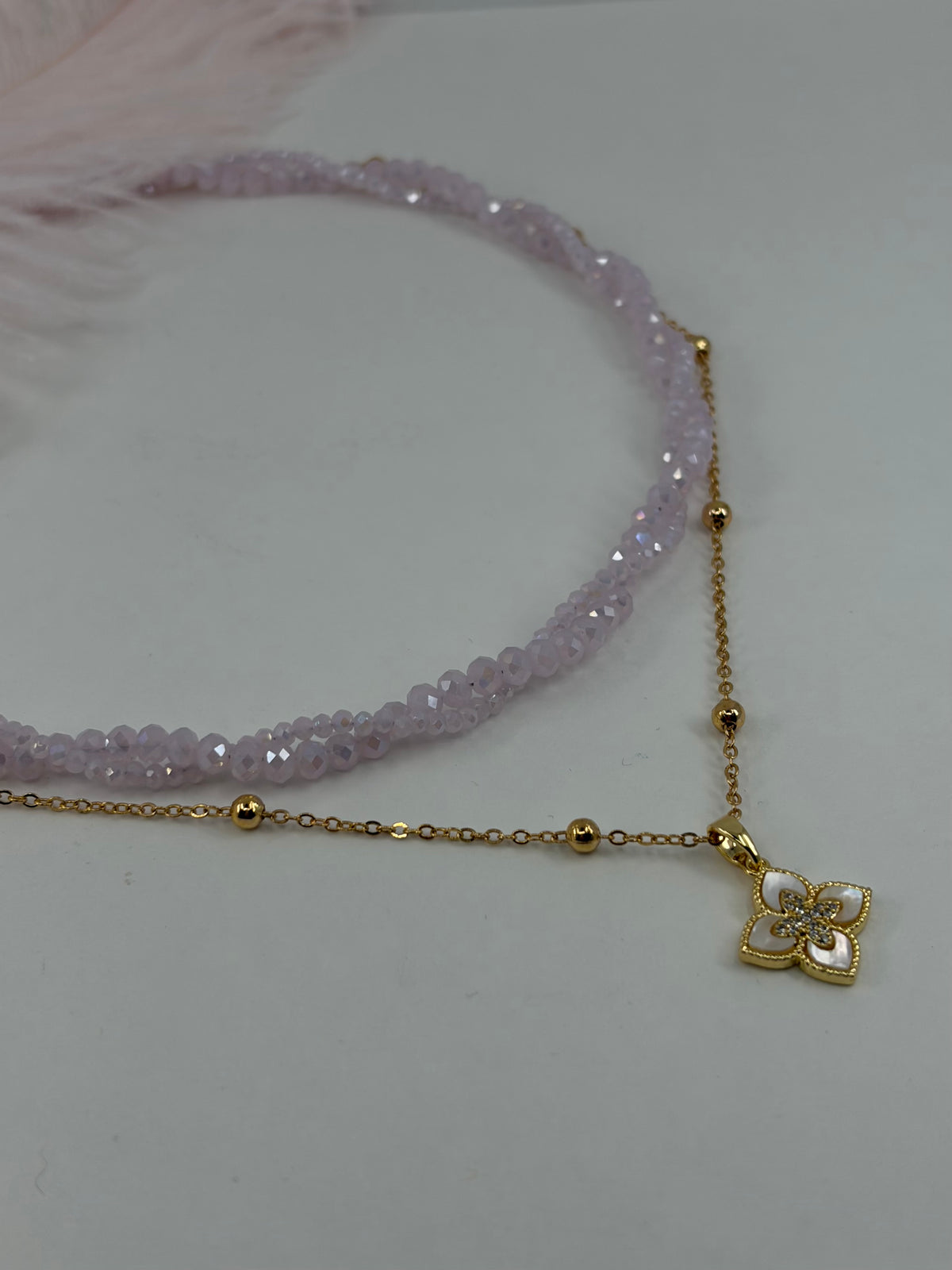 Pink crystal layered necklace with flower pendant pendant