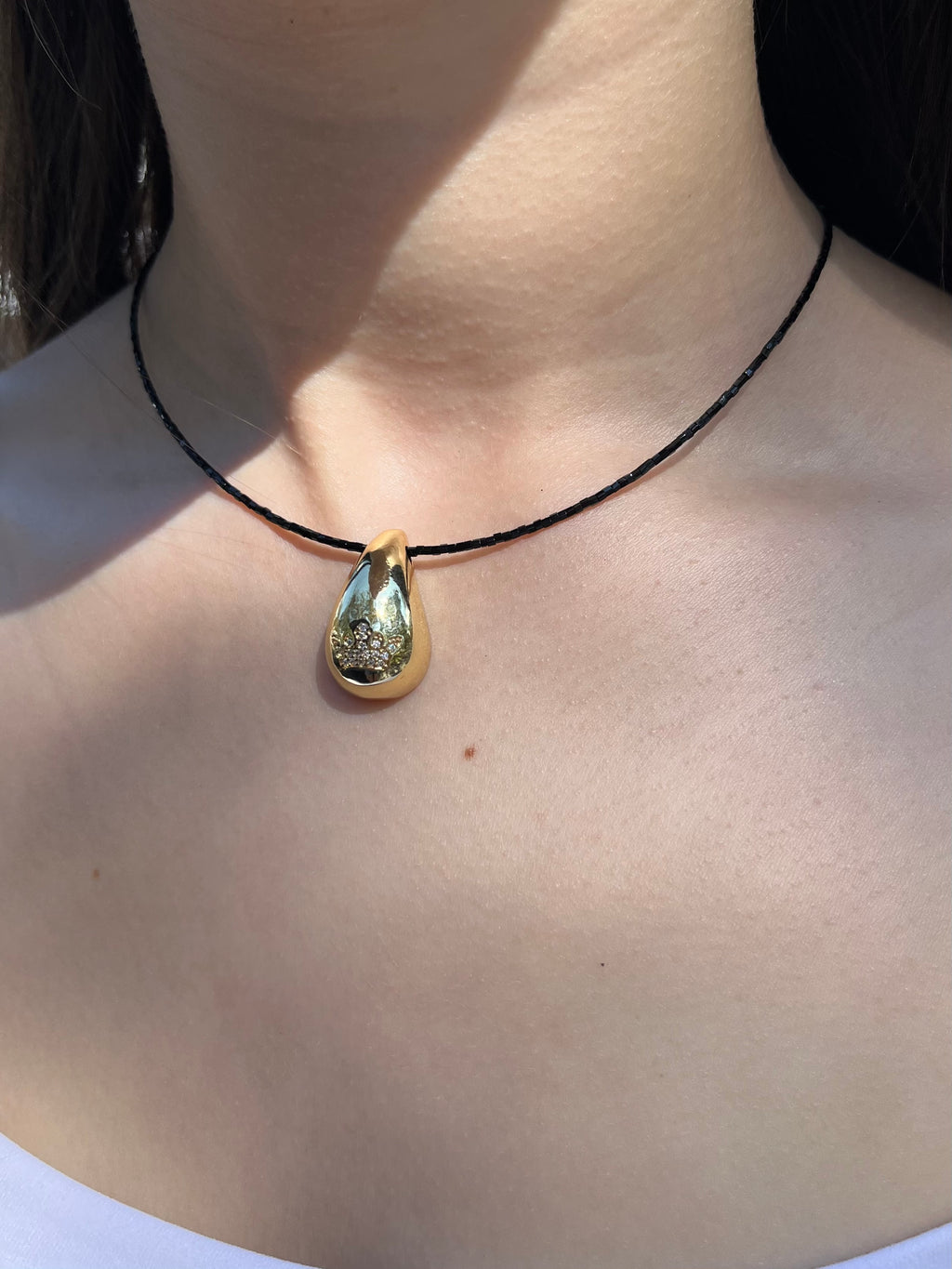 Black beaded choker with gold teardrop crown pendants: 18K Gold Plated