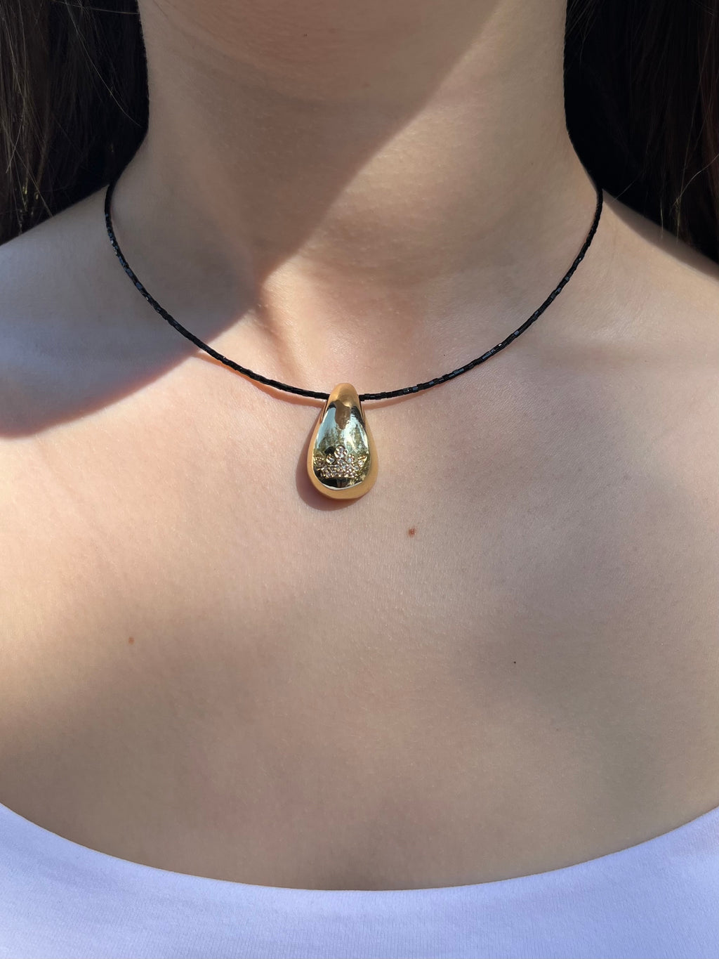 Black beaded choker with gold teardrop crown pendants: 18K Gold Plated