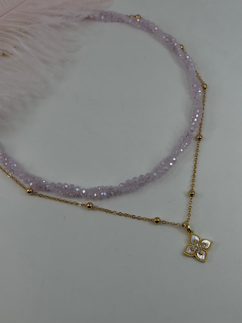 Pink crystal layered necklace with flower pendant pendant