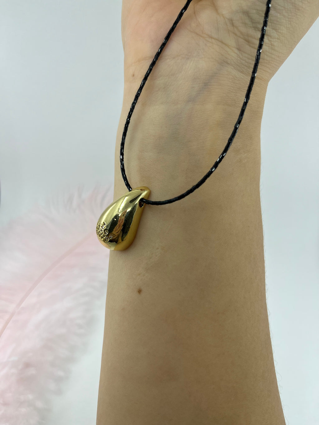 Black beaded choker with gold teardrop crown pendants: 18K Gold Plated
