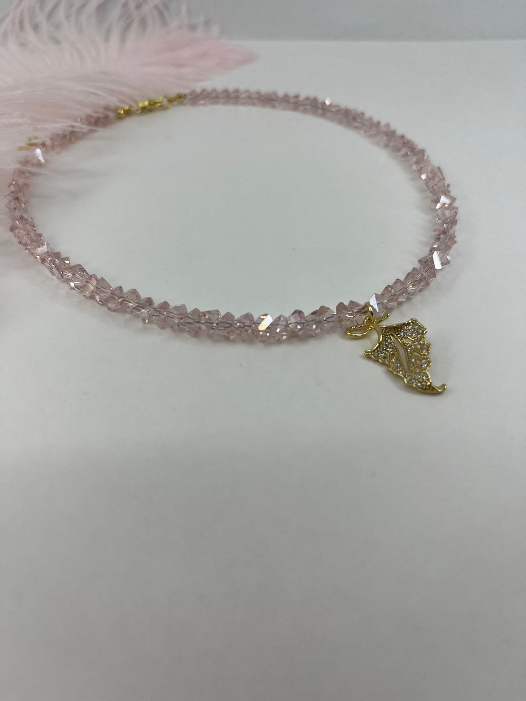 Pink crystal necklace with leaf pendant pendant
