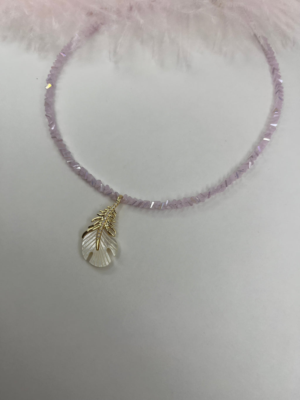 Pink crystal necklace with 14K gold Feather pendant