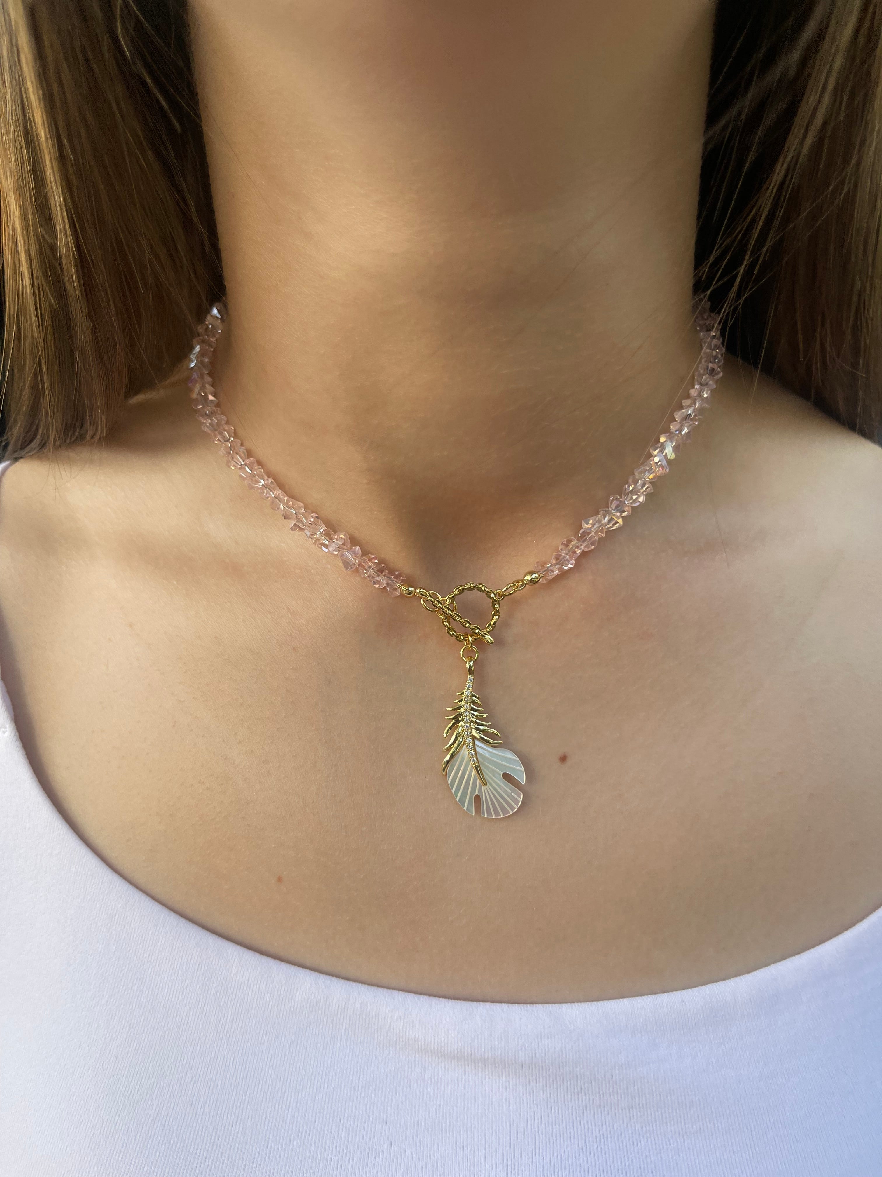 Pink crystal necklace with 14K gold Feather pendant