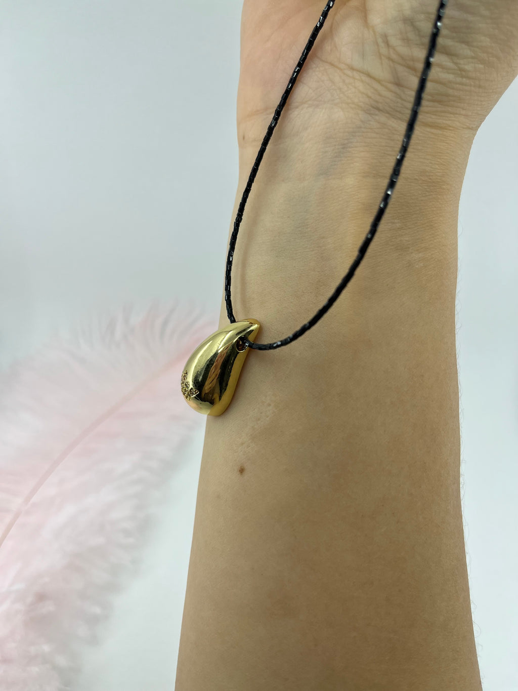 Black beaded choker with gold teardrop crown pendants: 18K Gold Plated
