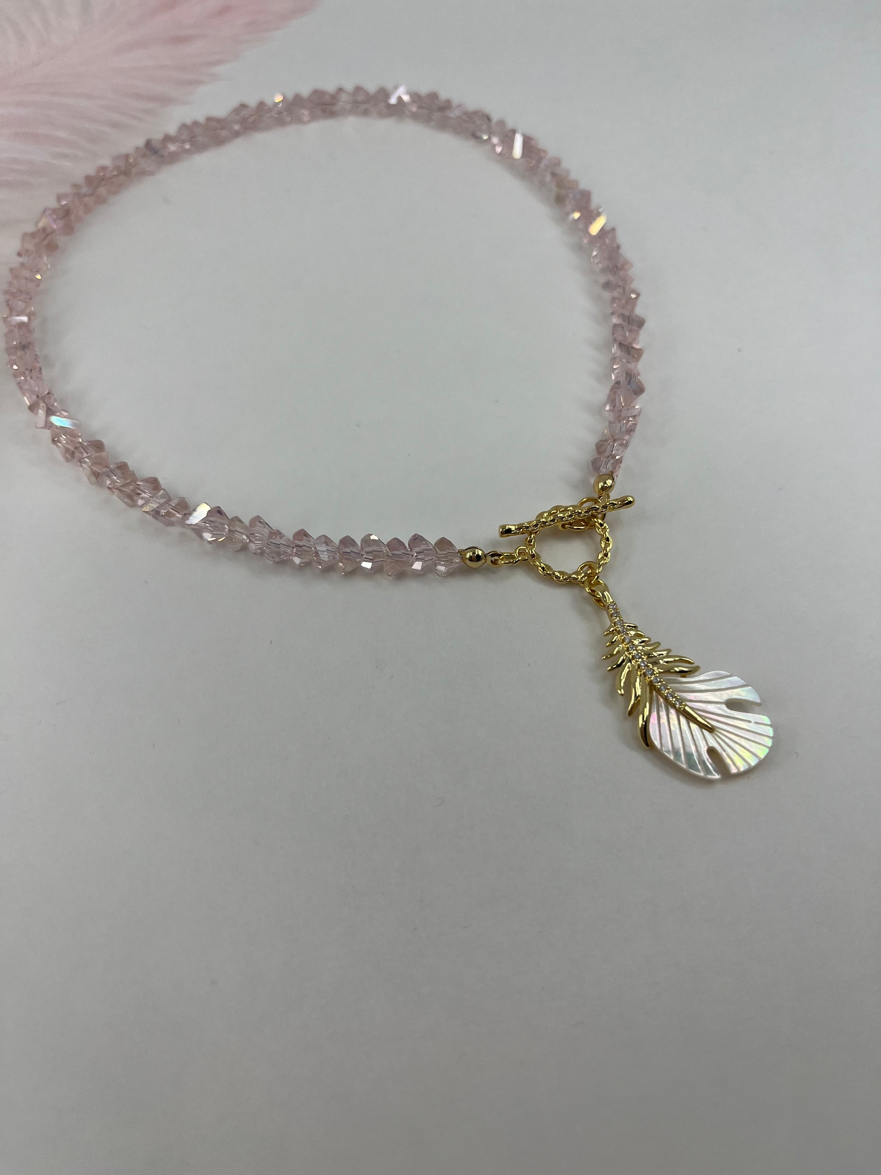 Pink crystal necklace with 14K gold Feather pendant