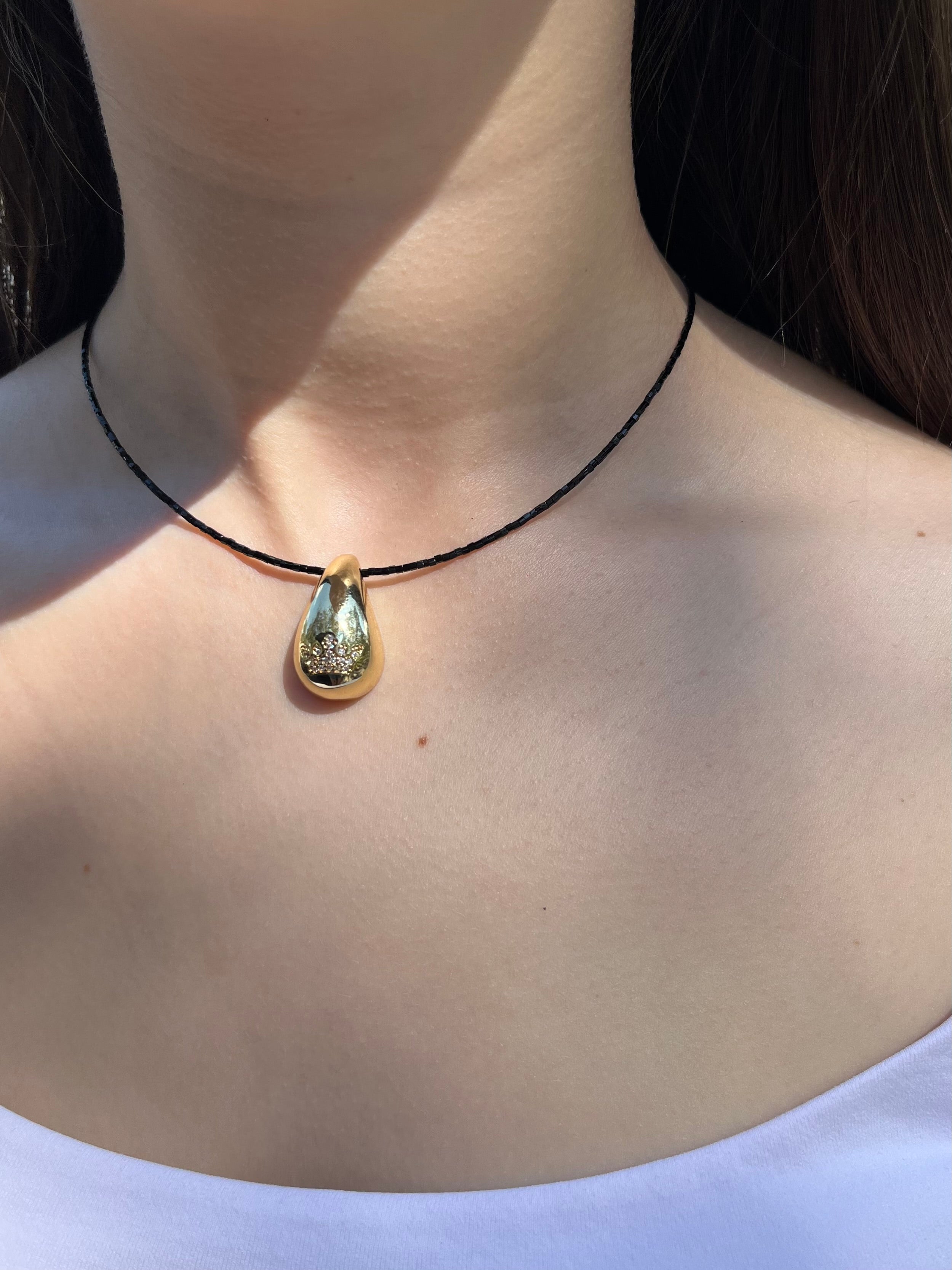 Black beaded choker with gold teardrop crown pendants: 18K Gold Plated
