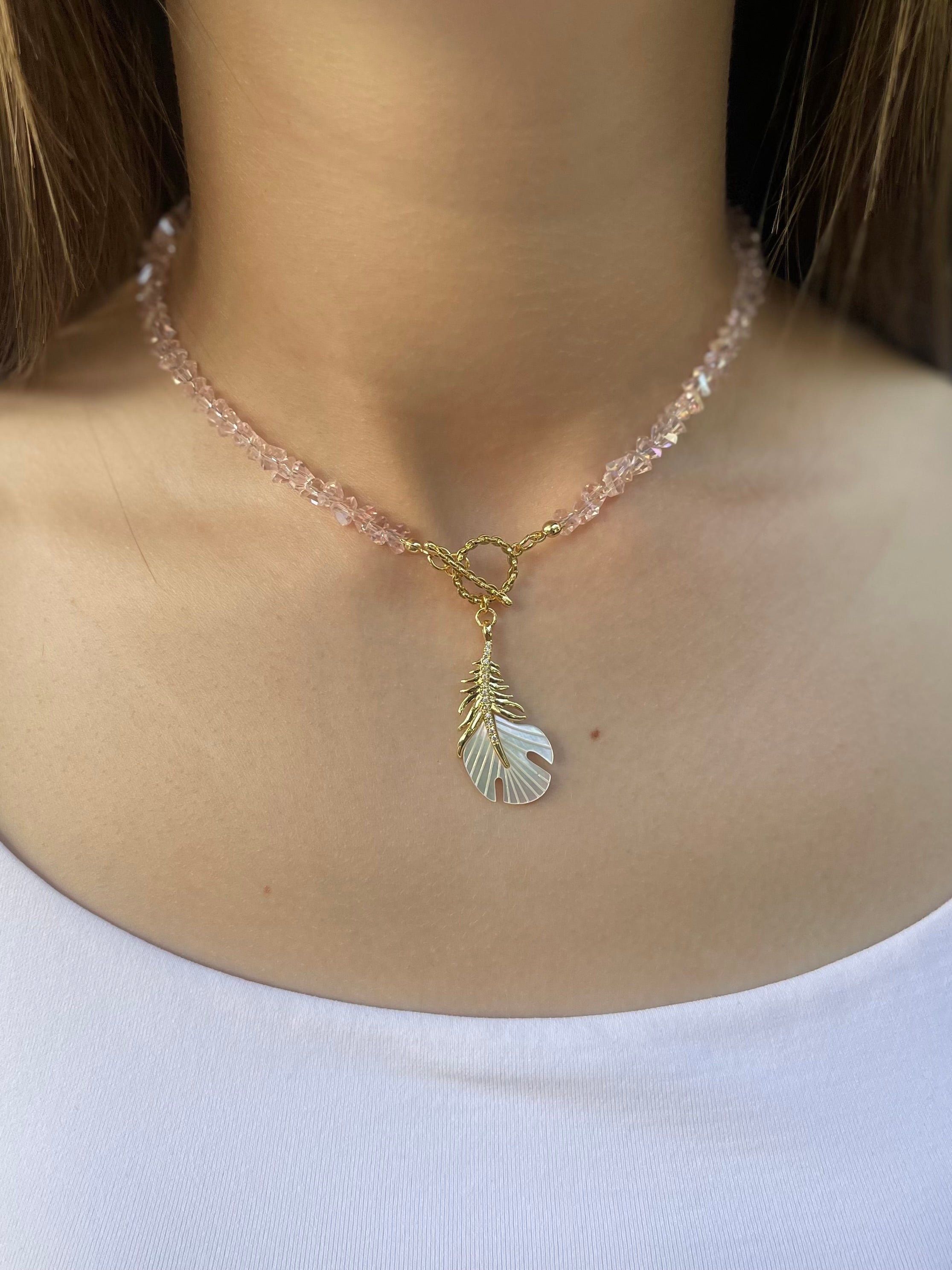 Pink crystal necklace with 14K gold Feather pendant