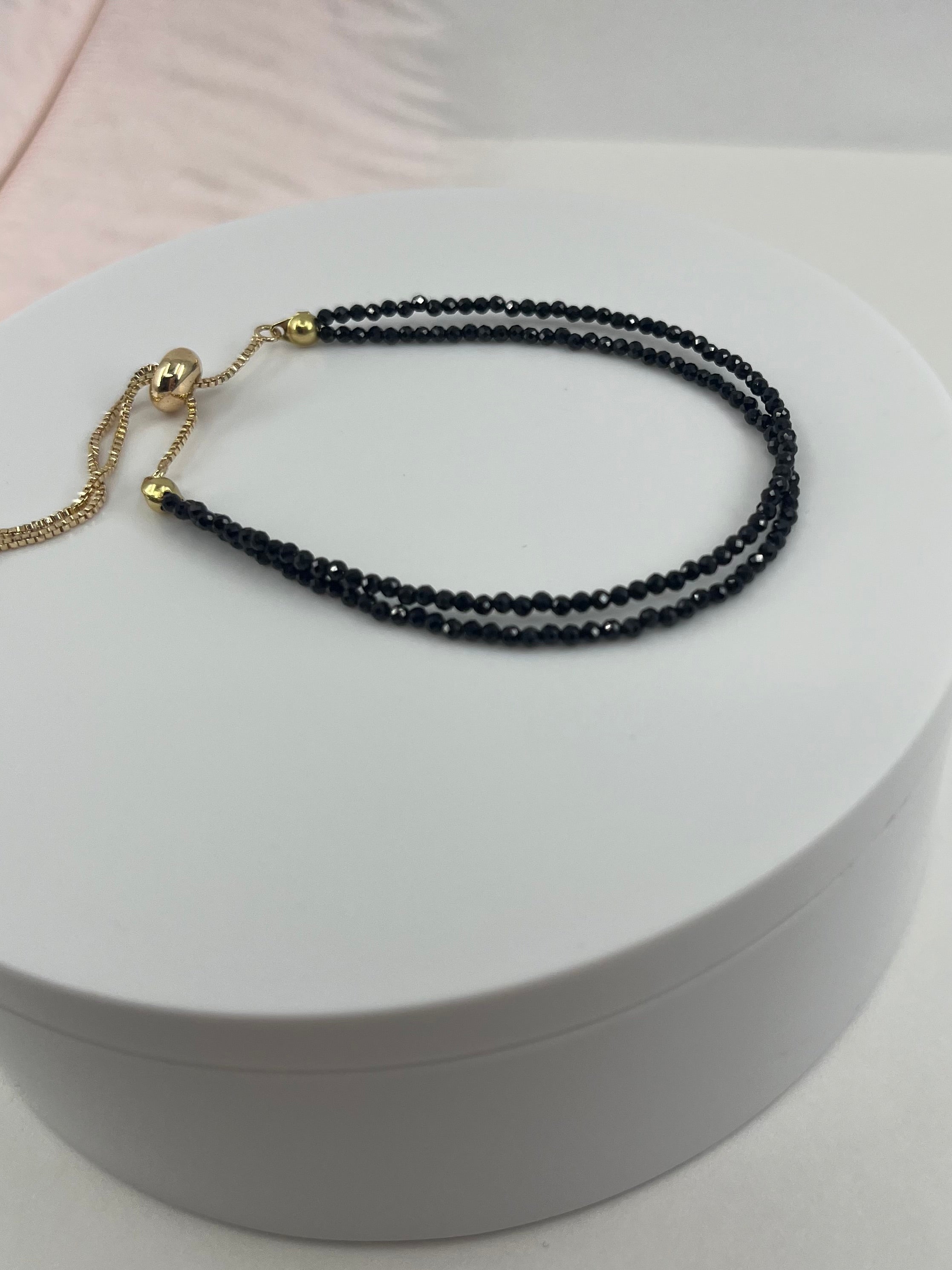 Black spinel layered bracelet with 18K Gold Plated slider