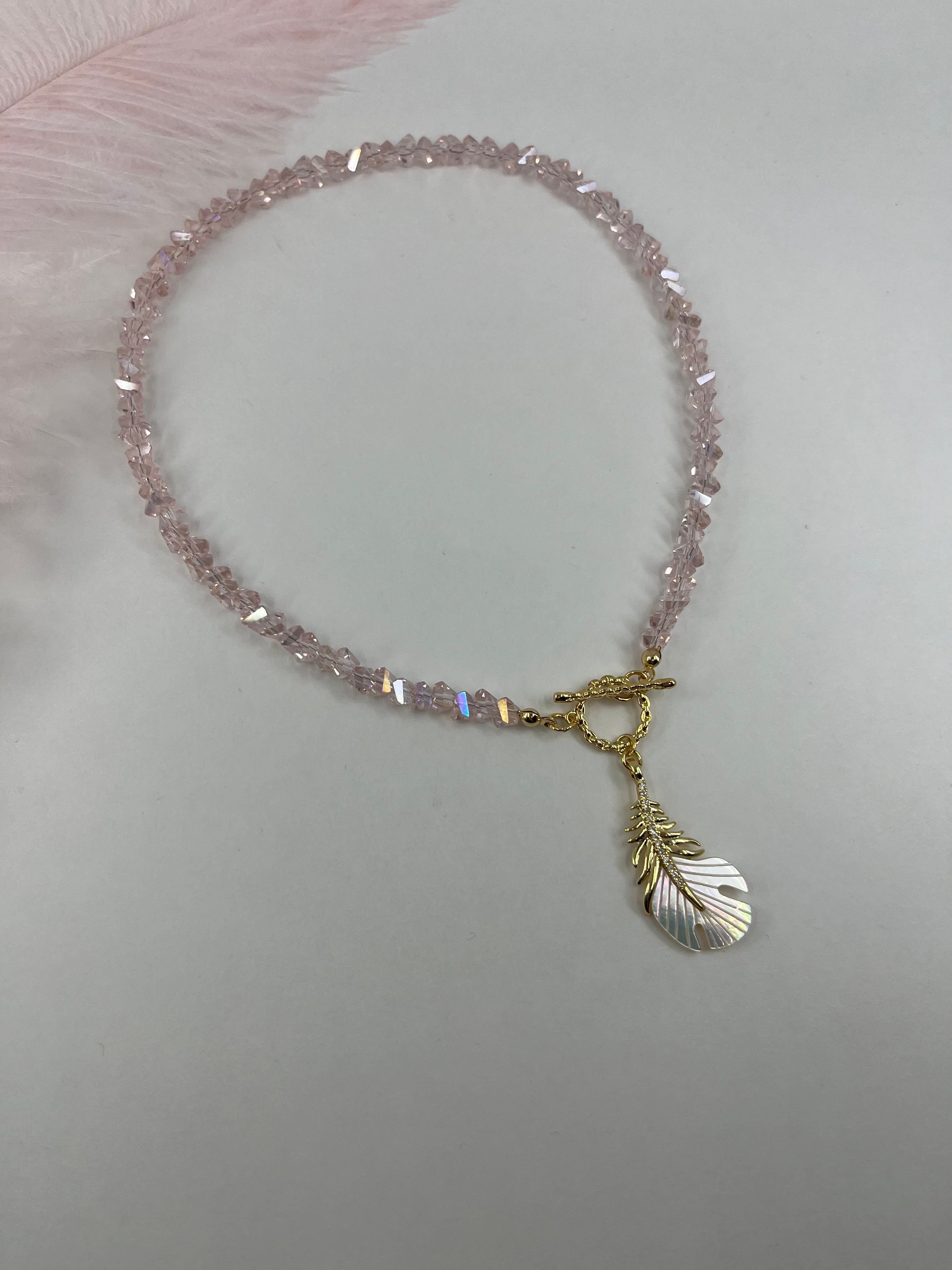 Pink crystal necklace with 14K gold Feather pendant