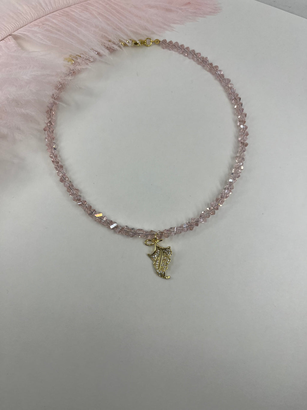Pink crystal necklace with leaf pendant pendant