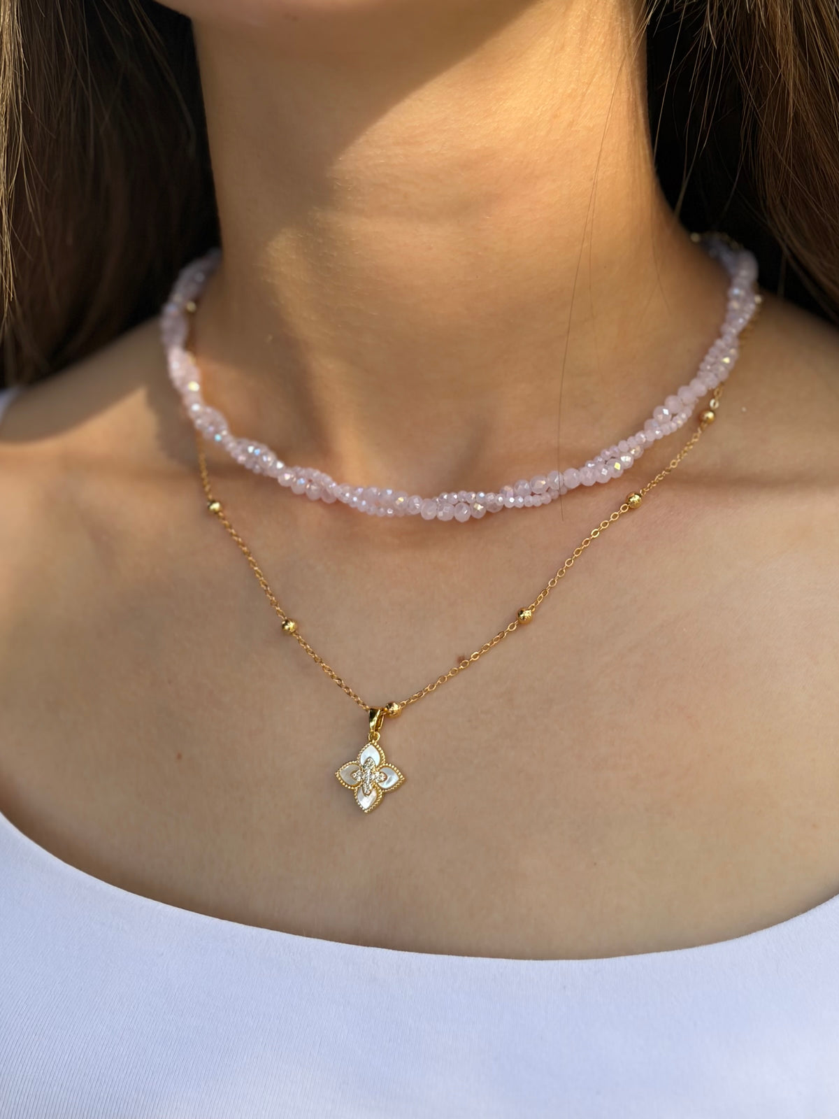 Pink crystal layered necklace with flower pendant pendant
