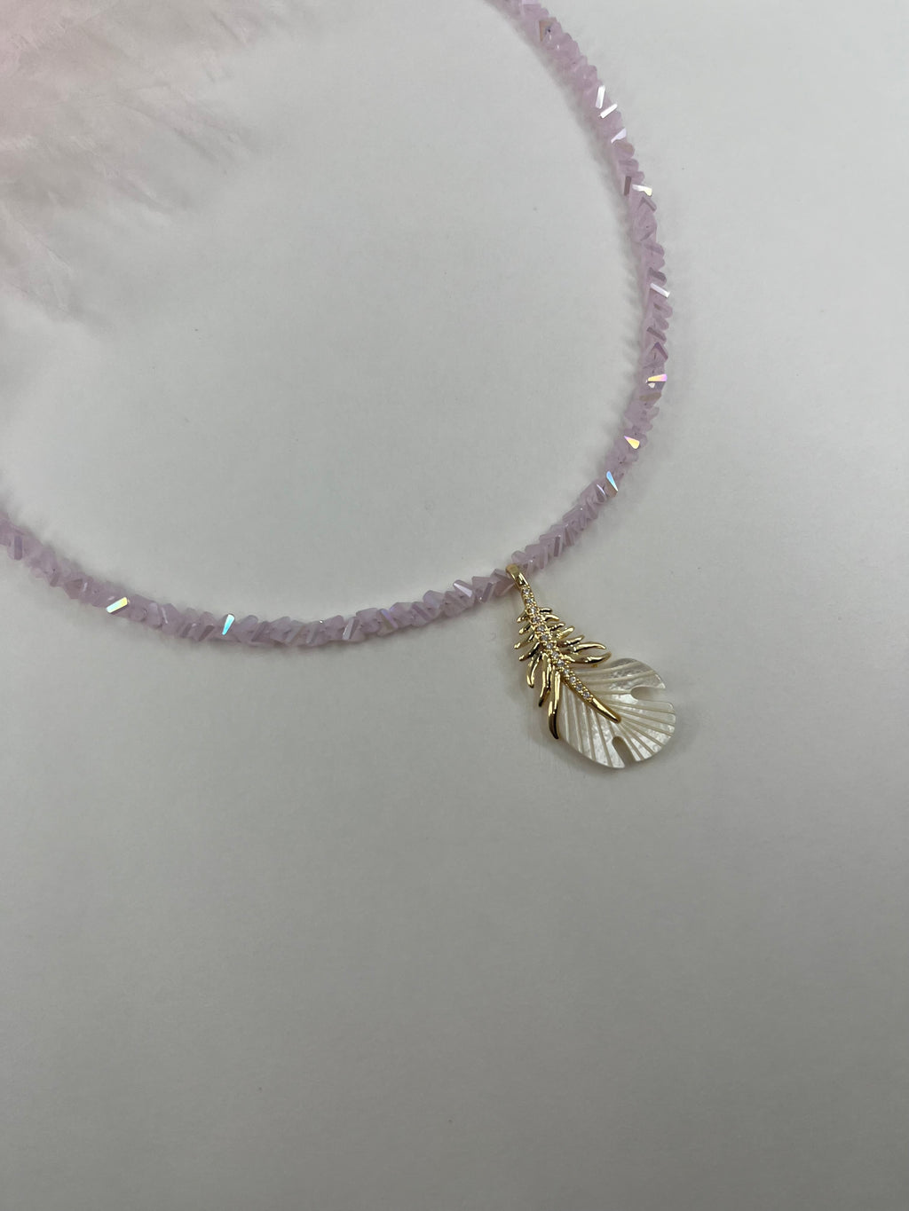 Pink crystal necklace with 14K gold Feather pendant