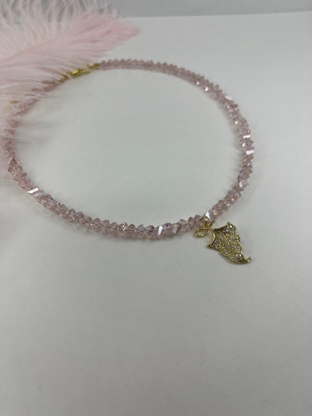Pink crystal necklace with leaf pendant pendant